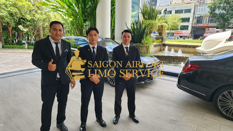 A friendly Saigon Airport Limo chauffeurs in a suit, ready to assist with transportation.