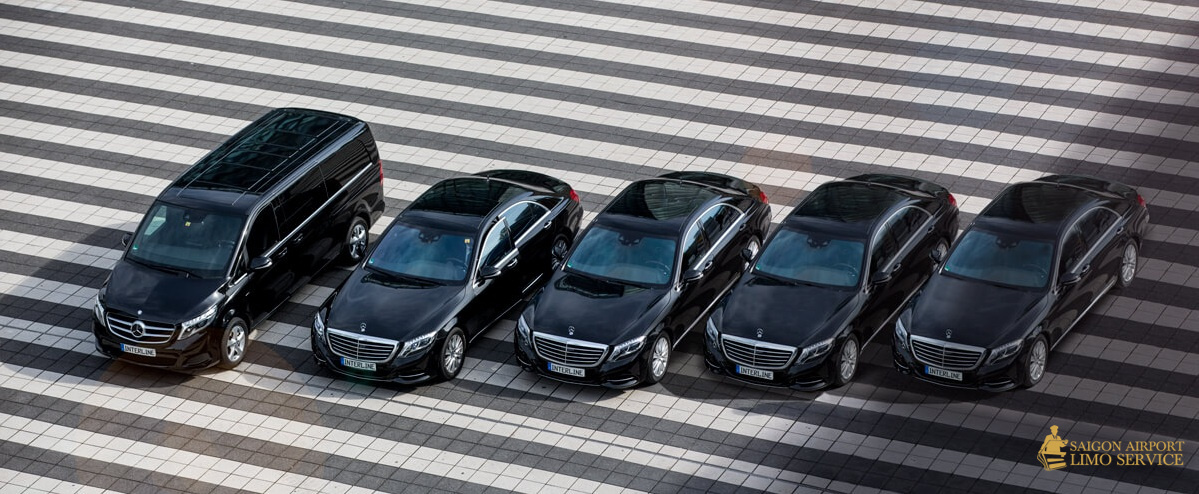Saigon Airport Limo: Our Extensive Mercedes-Benz Fleet Overhead view of Saigon Airport Limo's extensive fleet of black Mercedes-Benz S-Class sedans and V-Class vans, perfectly aligned for luxury transfers in Vietnam.